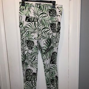 Multi colored leggings , size large